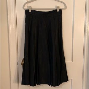 Vintage skirt; hard to appreciate it on hanger😙